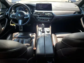 2018 BMW 5 Series 540i with VIN WBAJE5C51JWA94673, listed as a Copart auction lot 59807825 with 77,051 mi miles and Salvage title. Bid and sale history available at DreamBid. Image 8.