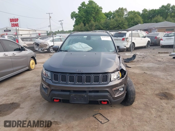 2019 Jeep Compass Trailhawk z VIN 3C4NJDDB9KT686048, wystawiony jako IAAI lot #42414161 z przebiegiem 92 683 mil mil oraz . Historia ofert i sprzedaży dostępna na DreamBid. Obrazek 11.