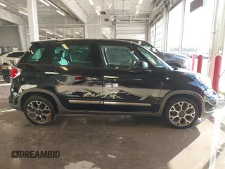 2014 FIAT 500L Trekking with VIN ZFBCFADH7EZ013366, listed as a IAAI auction lot 41017658 with 133,448 mi miles and . Bid and sale history available at DreamBid. Image 13.
