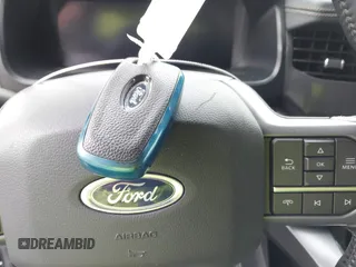 2023 Ford F-150 Lightning Pro with VIN 1FTVW1EL7PWG11924, listed as a IAAI auction lot 41991819 with 20,450 mi miles and . Bid and sale history available at DreamBid. Image 11.