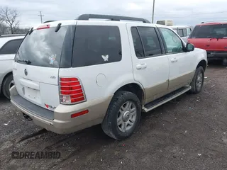2005 Mercury Mountaineer Convenience z VIN 4M2DU86K15ZJ26605, wystawiony jako IAAI lot #41831527 z przebiegiem 211 080 mil mil oraz . Historia ofert i sprzedaży dostępna na DreamBid. Obrazek 4.