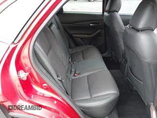 2023 Mazda CX-30 S Premium with VIN 3MVDMBDM1PM520048, listed as a IAAI auction lot 42468172 with 7,277 mi miles and . Bid and sale history available at DreamBid. Image 8.