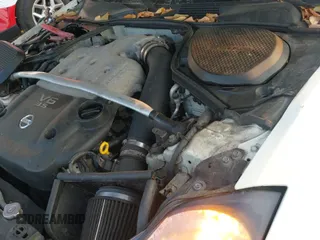 2003 Nissan 350Z with VIN JN1AZ34D43T114985, listed as a IAAI auction lot 42998170 with 121,050 mi miles and . Bid and sale history available at DreamBid. Image 19.