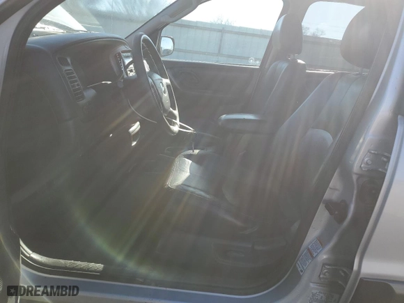 2003 Mazda Tribute ES with VIN 4F2CZ96153KM35676, listed as a Copart auction lot 46105805 with 102,381 mi miles and Salvage Title. Bid and sale history available at carsss.com. Image 7.