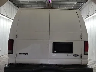 2010 Ford Econoline Cargo Commercial with VIN 1FTNE1EW4ADA91052, listed as a IAAI auction lot 42607935 with 163,519 mi miles and . Bid and sale history available at DreamBid. Image 54.