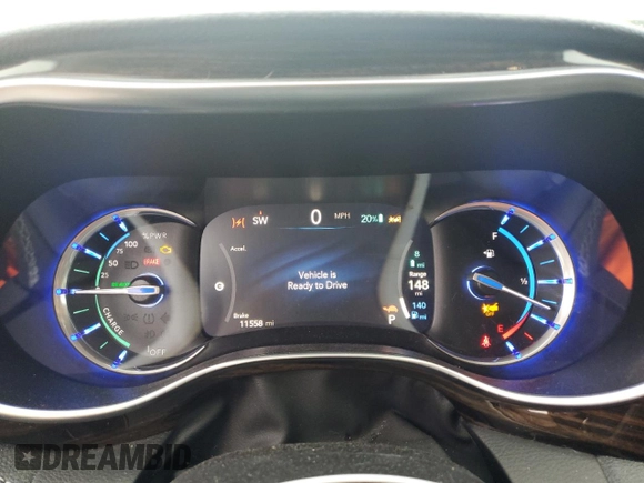 2023 Chrysler Pacifica Hybrid Limited with VIN 2C4RC1S70PR543587, listed as a Copart auction lot 60439795 with 11,558 mi miles and Salvage title. Bid and sale history available at DreamBid. Image 9.