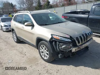 2014 Jeep Cherokee Latitude z VIN 1C4PJMCS4EW278677, wystawiony jako IAAI lot #41783878 z przebiegiem 141 214 mil mil oraz . Historia ofert i sprzedaży dostępna na DreamBid. Obrazek 1.