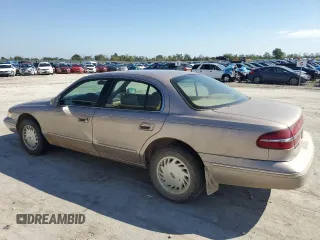 1995 Lincoln Continental with VIN 1LNLM97V8SY681113, listed as a Copart auction lot 73695134 with 176,175 mi miles and Salvage Title. Bid and sale history available at carsss.com. Image 2.