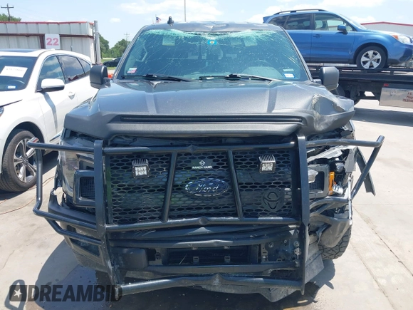 2019 Ford F-150 XL with VIN 1FTEW1E44KKE47489, listed as a IAAI auction lot 42211083 with 139,615 mi miles and . Bid and sale history available at DreamBid. Image 13.