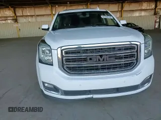 2017 GMC Yukon XL SLE with VIN 1GKS1FKC8HR222023, listed as a Copart auction lot 67496724 with 125,155 mi miles and Salvage Title. Bid and sale history available at carsss.com. Image 12.