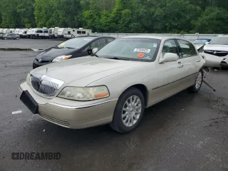 2006 Lincoln Town Car Signature z VIN 1LNHM81WX6Y645415, wystawiony jako Copart lot #57939425 z przebiegiem 91 829 mil mil oraz Szkoda całkowita • Salvage title. Historia ofert i sprzedaży dostępna na DreamBid. Obrazek 1.