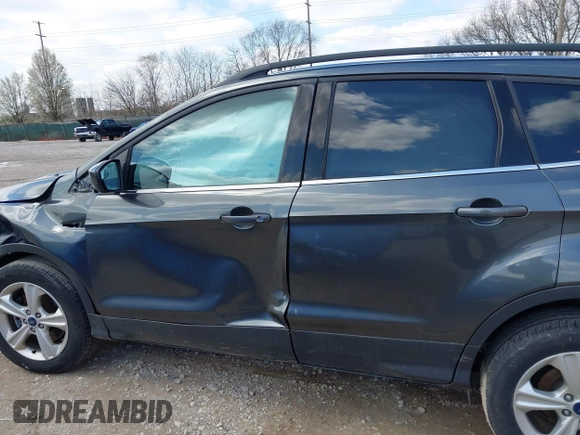 2016 Ford Escape SE z VIN 1FMCU9G92GUC37694, wystawiony jako IAAI lot #41917697 z przebiegiem 78 511 mil mil oraz . Historia ofert i sprzedaży dostępna na DreamBid. Obrazek 14.