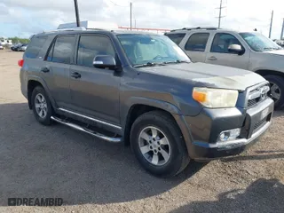 2011 Toyota 4Runner SR5 with VIN JTEZU5JR9B5026507, listed as a IAAI auction lot 41112035 with 128,126 mi miles. Bid and sale history available at carsss.com. Image 1.