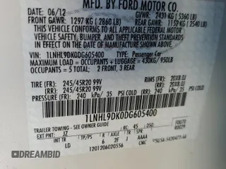 2013 Lincoln MKS z VIN 1LNHL9DK0DG605400, wystawiony jako Copart lot #77071034 z przebiegiem 73 450 mil mil oraz Szkoda całkowita • Salvage title. Historia ofert i sprzedaży dostępna na DreamBid. Obrazek 14.