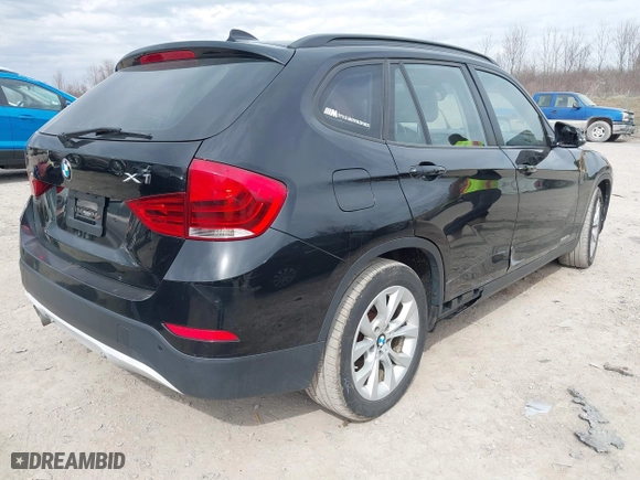 2013 BMW X1 xDrive28i with VIN WBAVL1C58DVR82070, listed as a IAAI auction lot 41849986 with 136,394 mi miles. Bid and sale history available at carsss.com. Image 4.