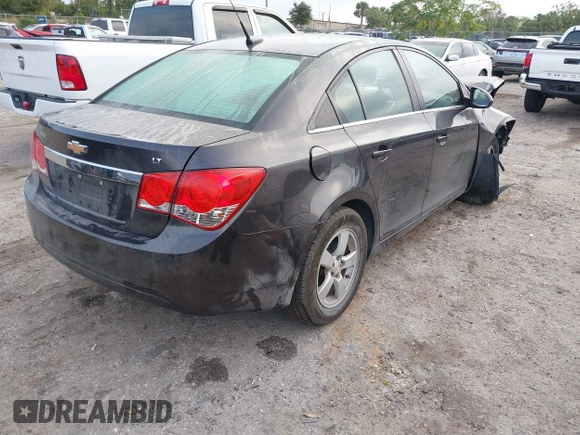2014 Chevrolet Cruze 1LT z VIN 1G1PC5SB9E7446821, wystawiony jako IAAI lot #40723456 z przebiegiem 137 378 mil mil oraz . Historia ofert i sprzedaży dostępna na DreamBid. Obrazek 4.