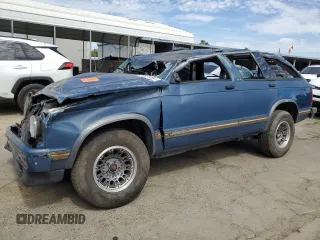 1994 GMC Jimmy SL with VIN 1GKCS13WXR0532905, listed as a Copart auction lot 60670404 with 116,002 mi miles and Non Repairable. Bid and sale history available at carsss.com. Image 1.