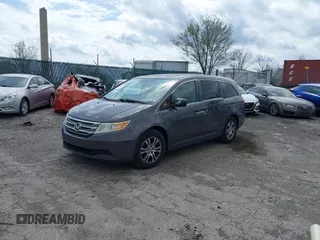 2013 Honda Odyssey EX-L with VIN 5FNRL5H63DB034963, listed as a IAAI auction lot 41921431 with 163,609 mi miles and . Bid and sale history available at DreamBid. Image 17.