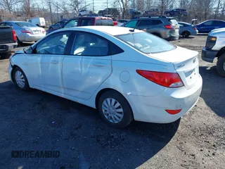 2015 Hyundai Accent GLS with VIN KMHCT4AEXFU905526, listed as a IAAI auction lot 41740175 with 104,023 mi miles and . Bid and sale history available at carsss.com. Image 3.