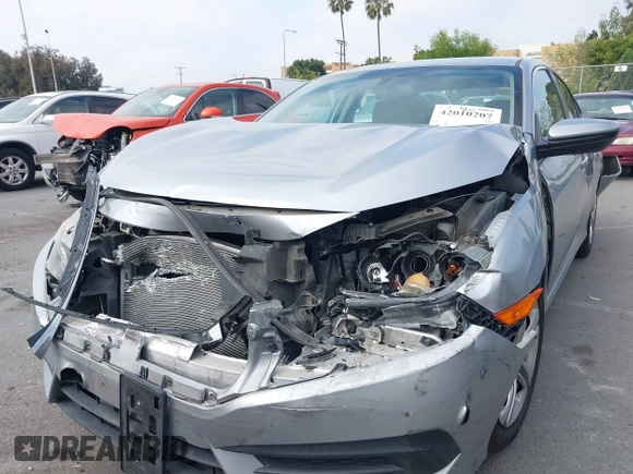 2017 Honda Civic LX with VIN 2HGFC2F5XHH562089, listed as a IAAI auction lot 42010207 with 99,809 mi miles and . Bid and sale history available at DreamBid. Image 6.