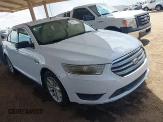 2014 Ford Taurus SE z VIN 1FAHP2D88EG170511, wystawiony jako IAAI lot #42208533 z przebiegiem 187 489 mil mil oraz . Historia ofert i sprzedaży dostępna na DreamBid. Obrazek 1.