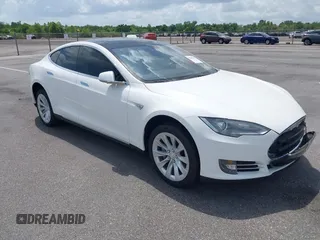 2014 Tesla Model S 60 with VIN 5YJSA1H12EFP39582, listed as a IAAI auction lot 42545143 with 117,383 mi miles and . Bid and sale history available at DreamBid. Image 1.