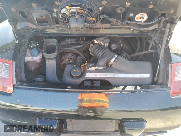 2006 Porsche 911 Carrera with VIN WP0CA29976S756591, listed as a Copart auction lot 77962404 with 110,147 mi miles and Salvage Title. Bid and sale history available at DreamBid. Image 11.