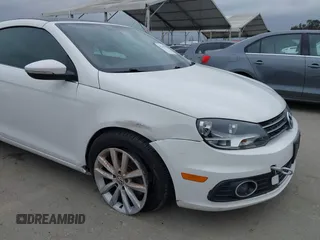2012 Volkswagen Eos Komfort with VIN WVWBW7AH6CV004193, listed as a IAAI auction lot 42194925 with 71,401 mi miles and . Bid and sale history available at DreamBid. Image 6.