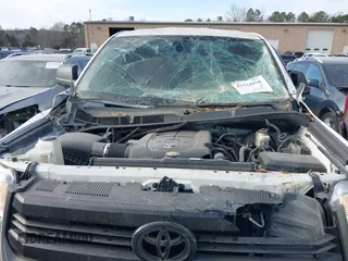 2016 Toyota Tundra 4WD Truck SR with VIN 5TFUW5F13GX569472, listed as a IAAI auction lot 41174168 with 181,703 mi miles. Bid and sale history available at carsss.com. Image 20.