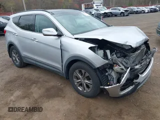2014 Hyundai Santa Fe z VIN 5XYZUDLBXEG215483, wystawiony jako IAAI lot #42071145 z przebiegiem 94 408 mil mil oraz . Historia ofert i sprzedaży dostępna na DreamBid. Obrazek 1.