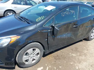 2015 Kia Forte LX with VIN KNAFK4A63F5419614, listed as a IAAI auction lot 42046799 with 117,596 mi miles. Bid and sale history available at carsss.com. Image 6.