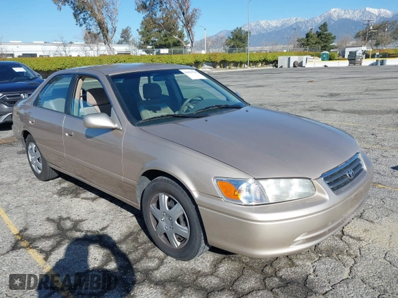 2001 Toyota Camry CE with VIN JT2BG22KX10559757, listed as a IAAI auction lot 41823719 with 72,775 mi miles. Bid and sale history available at carsss.com. Image 1.