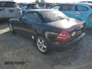 2001 Mercedes-Benz SLK-Class with VIN WDBKK65F51F217396, listed as a Copart auction lot 74339214 with 56,281 mi miles and Salvage Title. Bid and sale history available at carsss.com. Image 2.