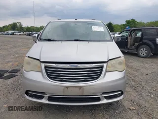 2011 Chrysler Town & Country Limited z VIN 2A4RR6DG9BR614281, wystawiony jako IAAI lot #42117737 z przebiegiem 191 656 mil mil oraz . Historia ofert i sprzedaży dostępna na DreamBid. Obrazek 6.