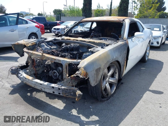 2013 Dodge Challenger SXT z VIN 2C3CDYAGXDH524225, wystawiony jako IAAI lot #41913504 z przebiegiem Nie podano mil oraz . Historia ofert i sprzedaży dostępna na DreamBid. Obrazek 2.