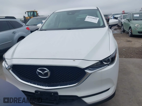 2017 Mazda CX-5 Touring z VIN JM3KFBCL5H0128584, wystawiony jako IAAI lot #42354669 z przebiegiem 56 563 mil mil oraz . Historia ofert i sprzedaży dostępna na DreamBid. Obrazek 12.