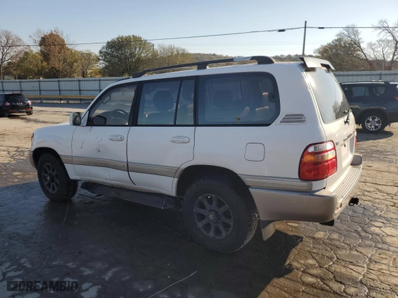 1999 Toyota Land Cruiser with VIN JT3HT05J8X0049750, listed as a Copart auction lot 77547144 with 168,435 mi miles and Salvage Title. Bid and sale history available at carsss.com. Image 2.