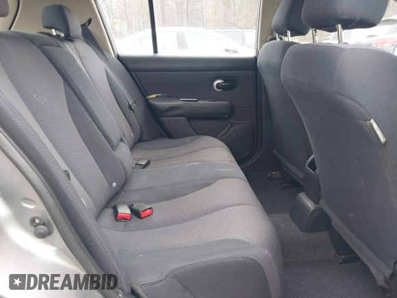 2009 Nissan Versa S with VIN 3N1BC13E59L407294, listed as a IAAI auction lot 41692951 with 250,029 mi miles and . Bid and sale history available at DreamBid. Image 8.