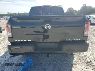 2021 Nissan Titan SL z VIN 1N6AA1ED6MN511883, wystawiony jako Copart lot #57115084 z przebiegiem 48 293 mil mil oraz Szkoda całkowita • Salvage title. Historia ofert i sprzedaży dostępna na DreamBid. Obrazek 6.