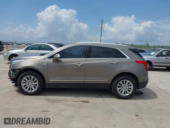 2018 Cadillac XT5 FWD with VIN 1GYKNARS5JZ145739, listed as a IAAI auction lot 42443337 with 50,917 mi miles and . Bid and sale history available at DreamBid. Image 14.
