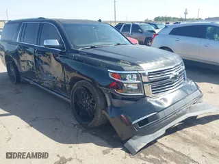 2015 Chevrolet Suburban LTZ with VIN 1GNSCKKC4FR184745, listed as a IAAI auction lot 41687313 with 225,794 mi miles. Bid and sale history available at carsss.com. Image 1.