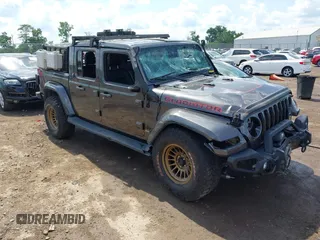 2021 Jeep Gladiator High Altitude with VIN 1C6HJTFGXML534303, listed as a IAAI auction lot 42542102 with 53,845 mi miles and . Bid and sale history available at DreamBid. Image 1.