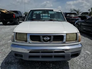 1998 Nissan Frontier XE z VIN 1N6DD21S5WC335549, wystawiony jako Copart lot #61021245 z przebiegiem 310 230 mil mil oraz Czysty tytuł • Clean title. Historia ofert i sprzedaży dostępna na DreamBid. Obrazek 5.