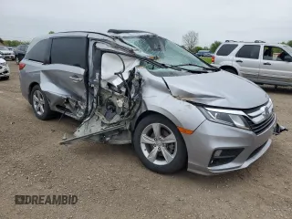 2019 Honda Odyssey EX-L z VIN 5FNRL6H7XKB049729, wystawiony jako Copart lot #55953075 z przebiegiem 129 194 mil mil oraz Szkoda całkowita • Salvage title. Historia ofert i sprzedaży dostępna na DreamBid. Obrazek 4.