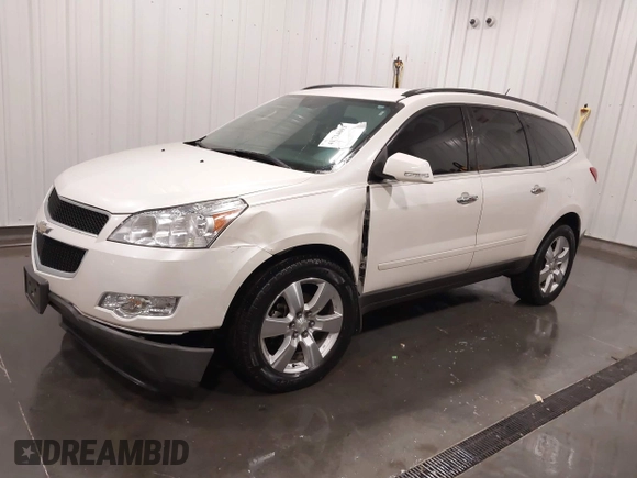 2012 Chevrolet Traverse 1LT z VIN 1GNKRGED5CJ410592, wystawiony jako IAAI lot #41714693 z przebiegiem 108 206 mil mil oraz . Historia ofert i sprzedaży dostępna na DreamBid. Obrazek 18.