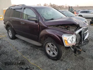 2005 Dodge Durango SLT z VIN 1D4HD48DX5F509039, wystawiony jako Copart lot #82547404 z przebiegiem 325 159 mil mil oraz Szkoda całkowita • Salvage title. Historia ofert i sprzedaży dostępna na DreamBid. Obrazek 4.