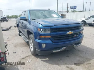2017 Chevrolet Silverado 1500 LT with VIN 3GCUKREC8HG462719, listed as a IAAI auction lot 41940176 with 380,676 mi miles and . Bid and sale history available at DreamBid. Image 1.
