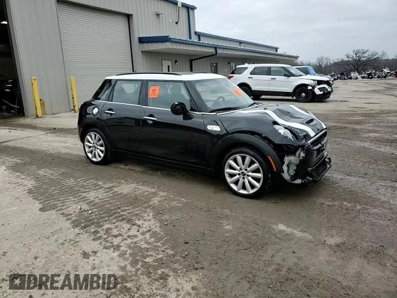2021 MINI Hardtop 4 Door Cooper S с VIN WMWXU9C04M2M96933, выставлен на аукционе Copart как лот 80886524 с пробегом 60 746 миль миль и Списание • Salvage title. История ставок и продаж доступна на DreamBid. Изображение 13.