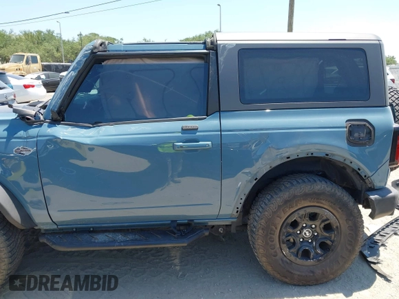 2021 Ford Bronco z VIN 1FMDE5CP5MLA98340, wystawiony jako IAAI lot #42064998 z przebiegiem 38 569 mil mil oraz . Historia ofert i sprzedaży dostępna na DreamBid. Obrazek 6.