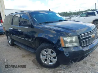 2009 Chevrolet Suburban LTZ z VIN 1GNFC36029R162836, wystawiony jako IAAI lot #42410812 z przebiegiem 254 466 mil mil oraz . Historia ofert i sprzedaży dostępna na DreamBid. Obrazek 1.